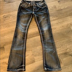 Amethyst jeans with some flare at the bottom